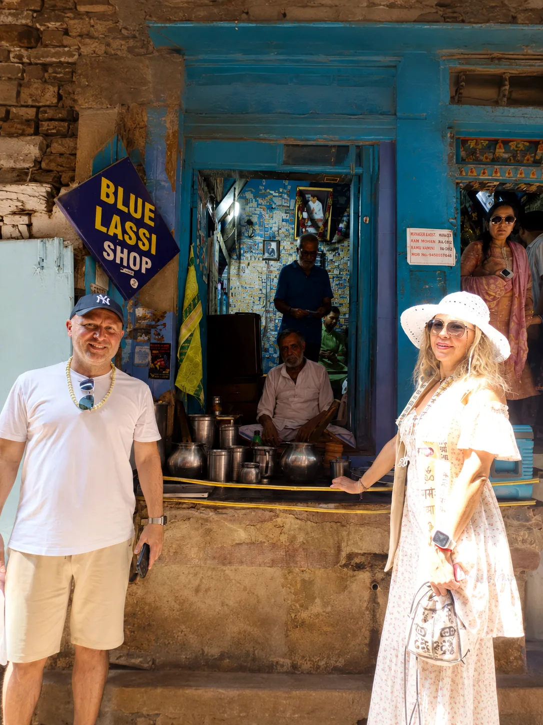 Travellers outside the Blue Lassi Shop during a food walk in old Varanasi