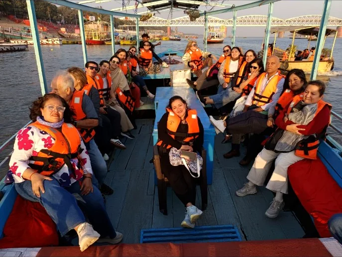 Private group travelling by boat on the River Ganges in Varanasi