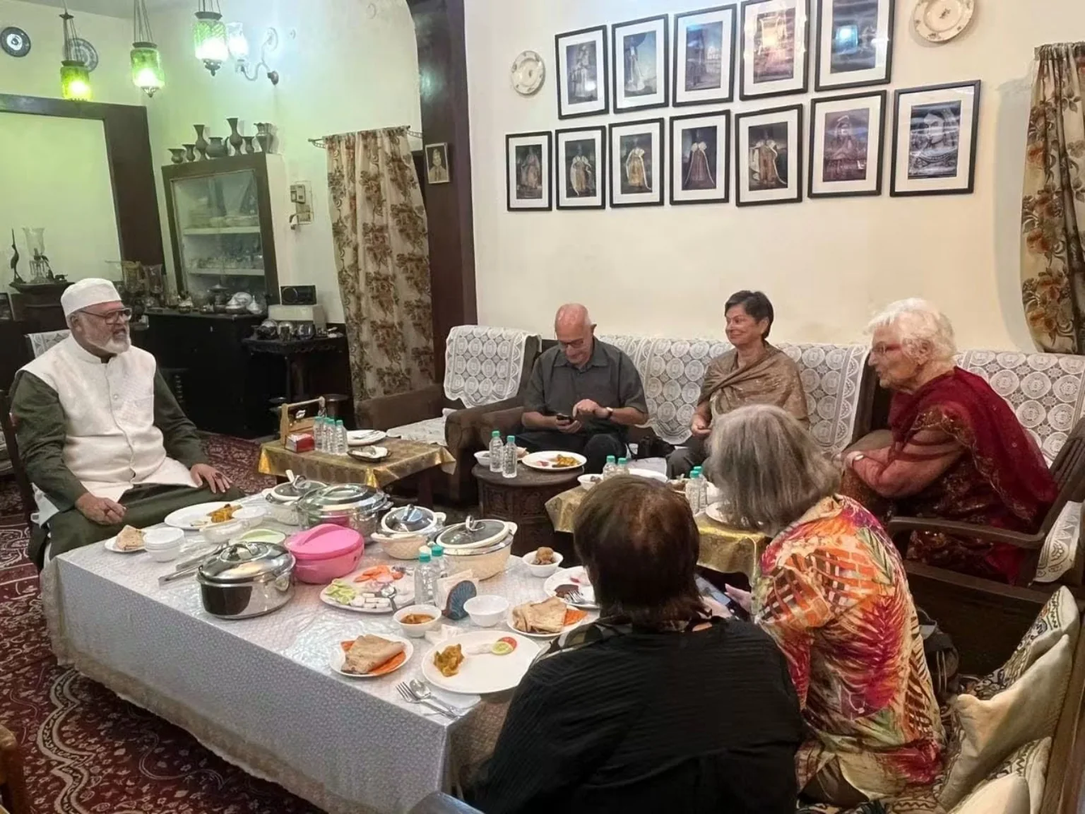 Guests sharing a hosted meal in Lucknow