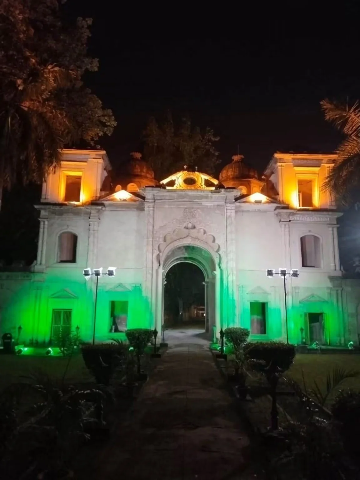 An illuminated gateway in Lucknow