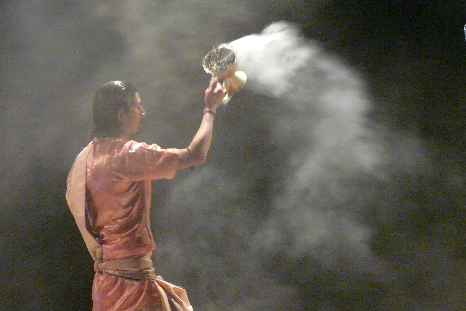 International travellers taking part respectfully in the evening Ganga Aarti ceremony in Varanasi