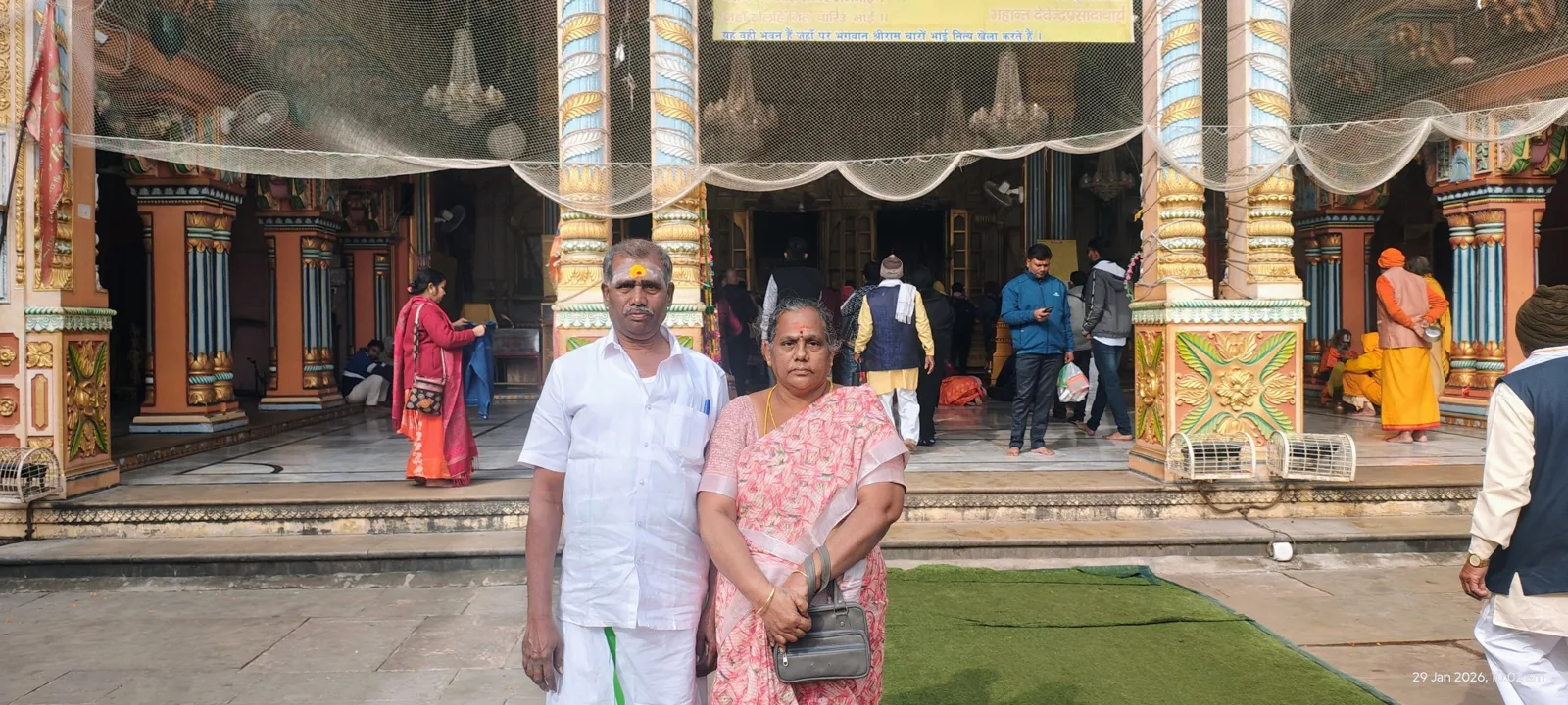 Guests visiting a temple courtyard in Ayodhya