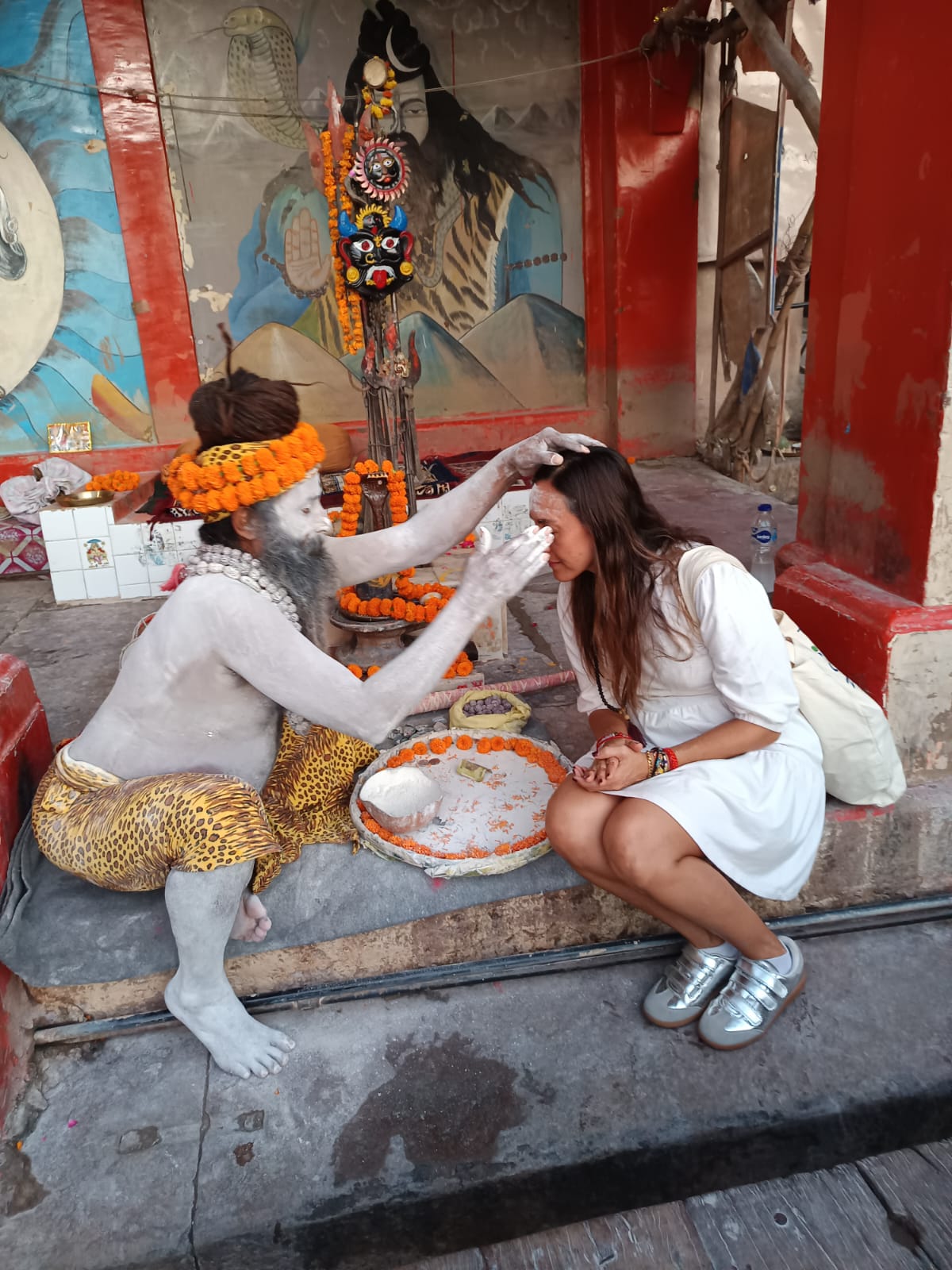 Guest receiving a traditional blessing during a guided Varanasi experience